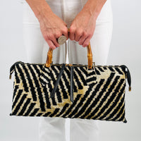  carpet handbag
carpet bag
carpet purse