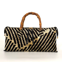 carpet handbag
carpet bag
carpet purse
