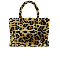carpet handbag
carpet bag
carpet purse