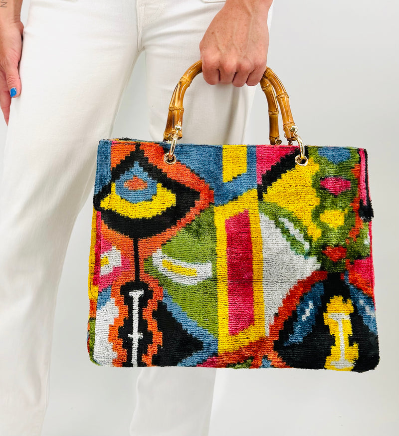 carpet handbag
carpet bag
carpet purse
