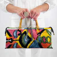 carpet handbag
carpet bag
carpet purse