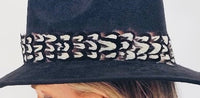 Black Suede Hat with Brown and White Feather