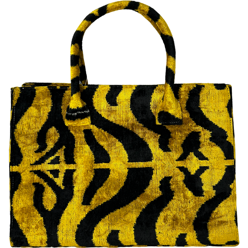 carpet handbag
carpet bag
carpet purse